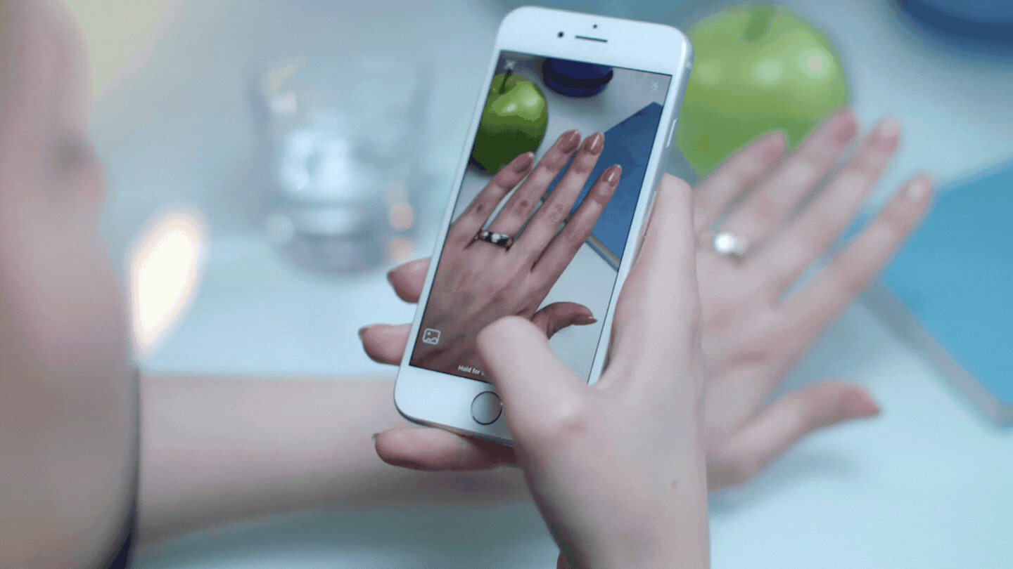 gif of some freshly painted nails being uploaded to instagram reels